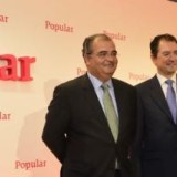 À esquerda, Ángel, Ron, presidente do Banco Popular