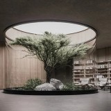 Uma casa bunker com um design moderno e minimalista no meio do campo