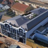 Edifício industrial com 100 anos convertido em habitação de luxo no Braço de Prata