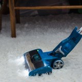 Aspirador em tapete felpudo